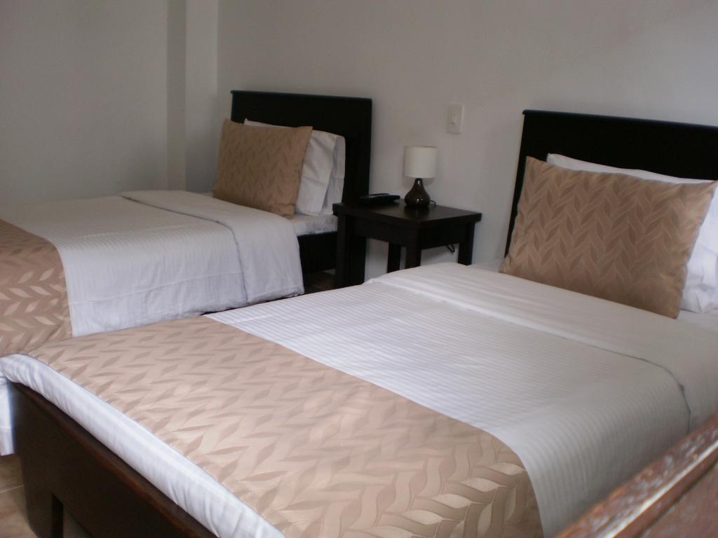 Casa Hotel Las Orquideas Circasia Pokoj fotografie